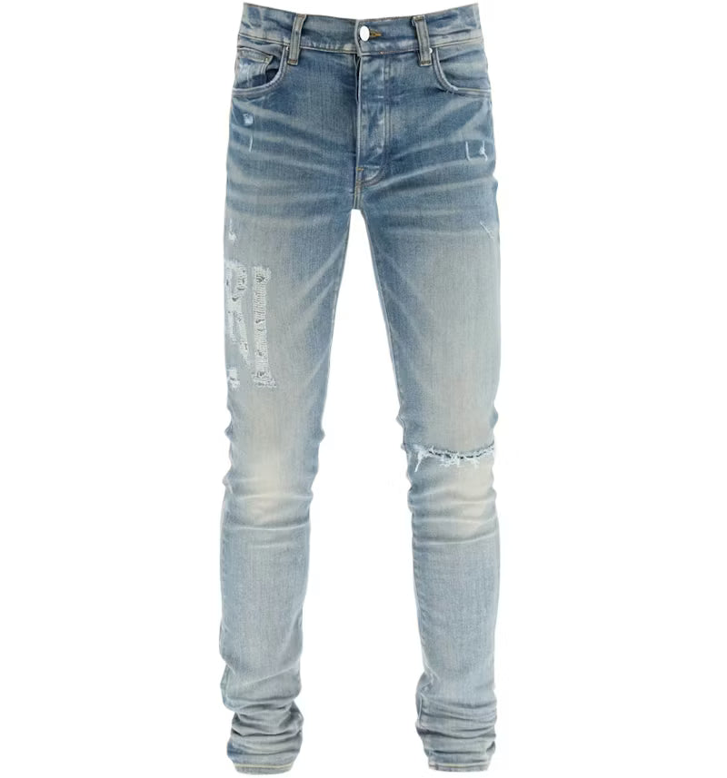 AMIRI Distressed Logo Skinny Jeans